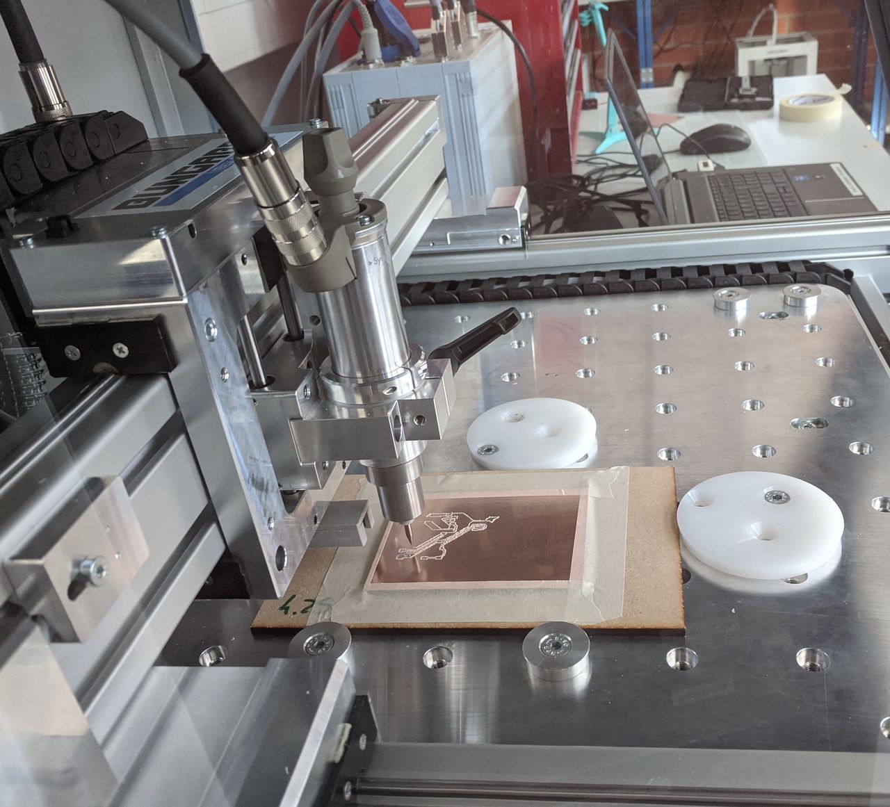 Milling a PCB.